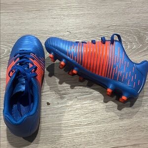 Blue and Orange Soccer Cleats